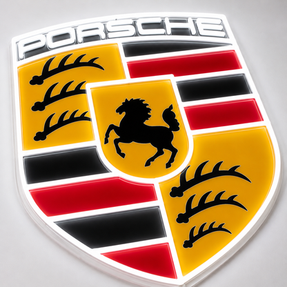 Angled view of Porsche crest shield neon light sign with backlit acrylic finish