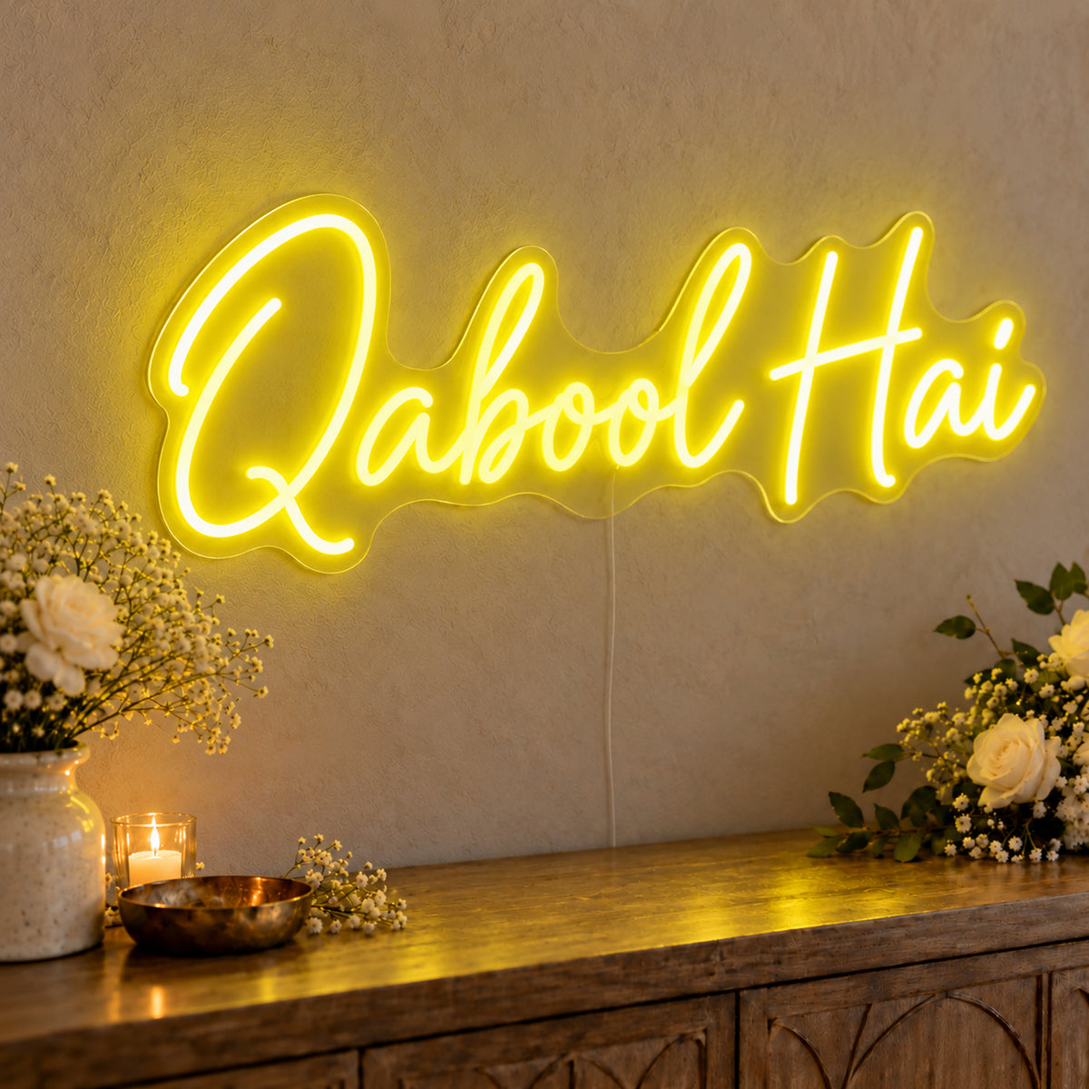 Qabool Hai Neon Sign in yellow LED neon on clear acrylic, angled view