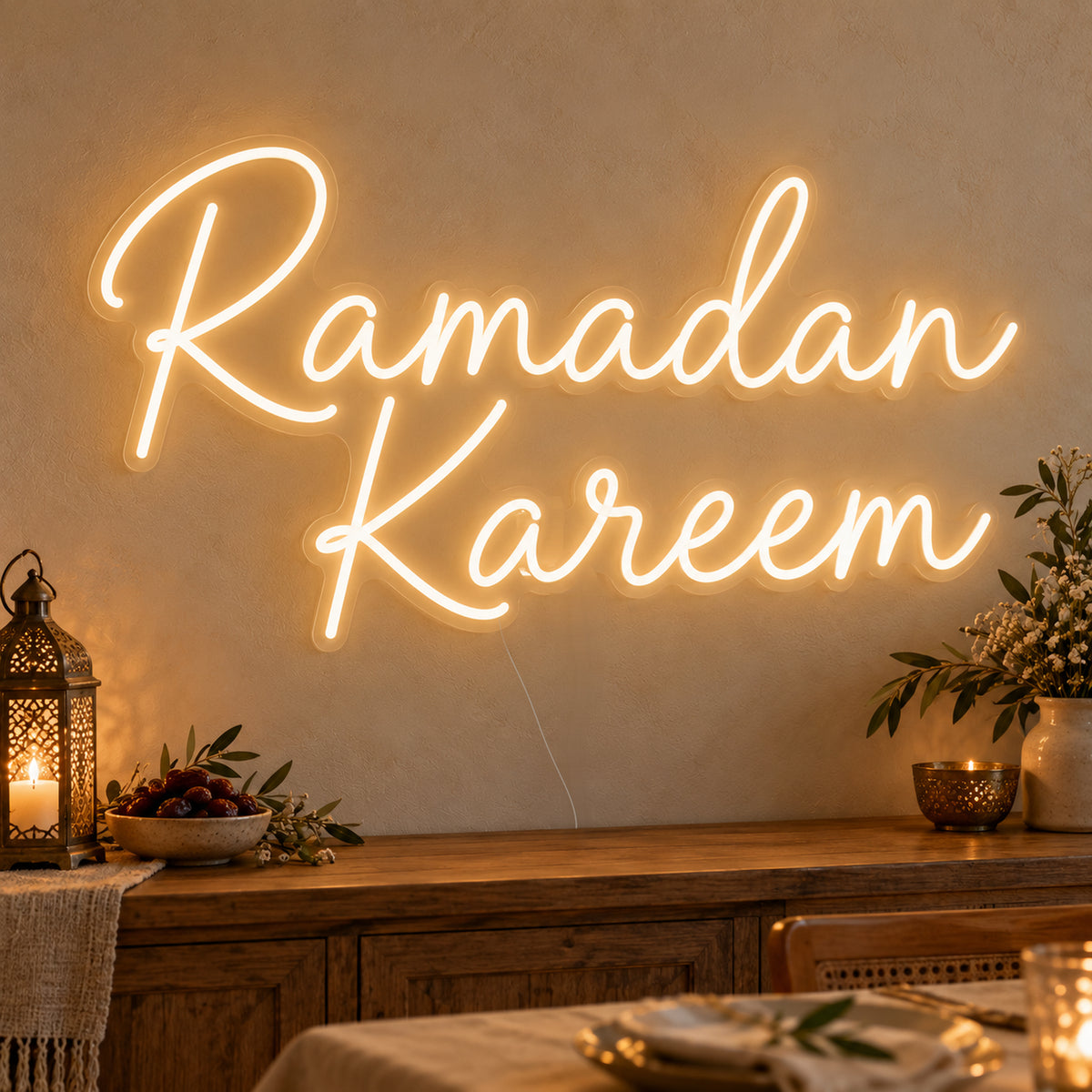 Ramadan Kareem Neon Sign on clear cut-to-shape acrylic, illuminated on a wall in a styled celebration setting
