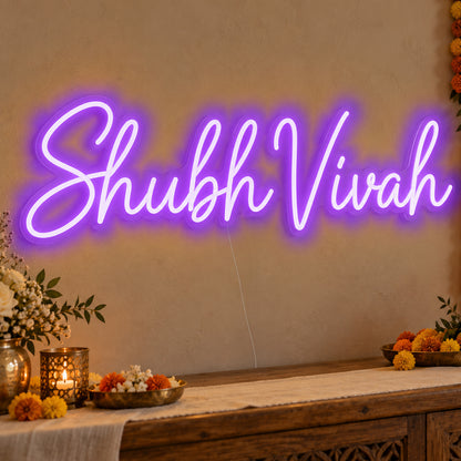 Shubh Vivah Neon Sign in purple LED neon on clear acrylic, angled view
