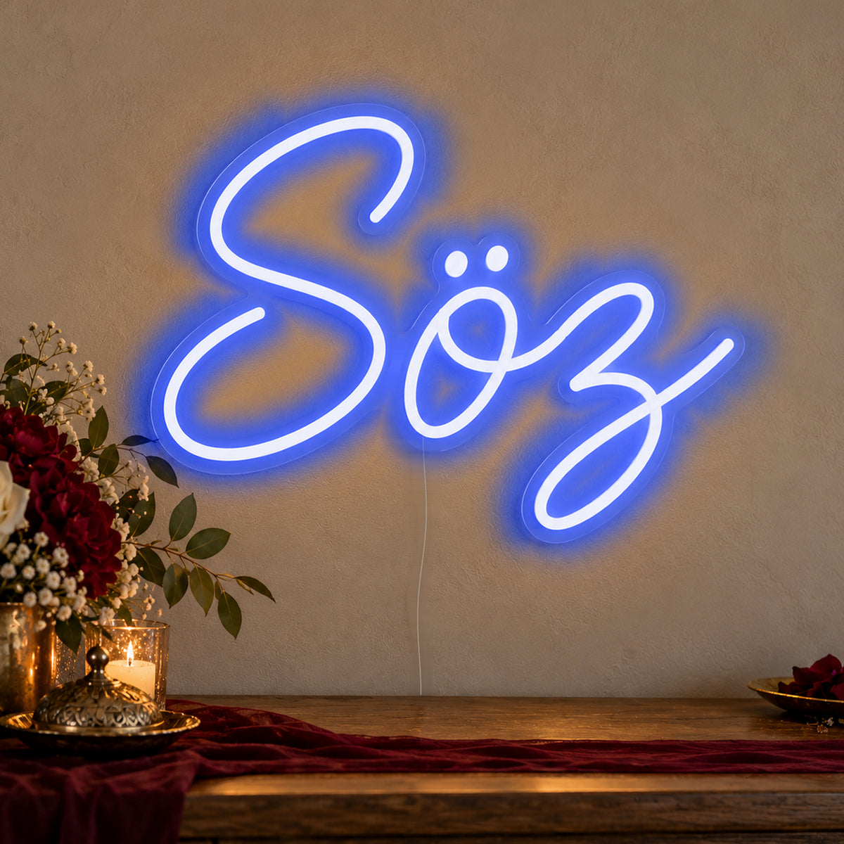 Söz Neon Sign in blue LED neon on clear acrylic, angled view