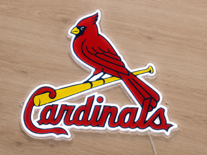 Angled view of St. Louis Cardinals neon sign glowing red and yellow