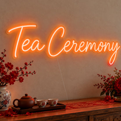 Tea Ceremony Neon Sign in orange LED neon on clear acrylic, angled view