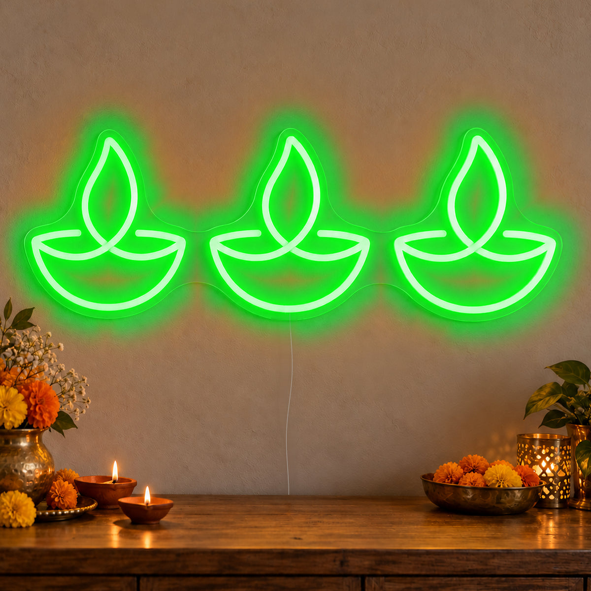 Three Diyas Neon Sign in green LED neon on clear acrylic, angled view