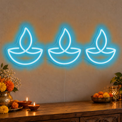 Three Diyas Neon Sign in ice blue LED neon on clear acrylic, angled view