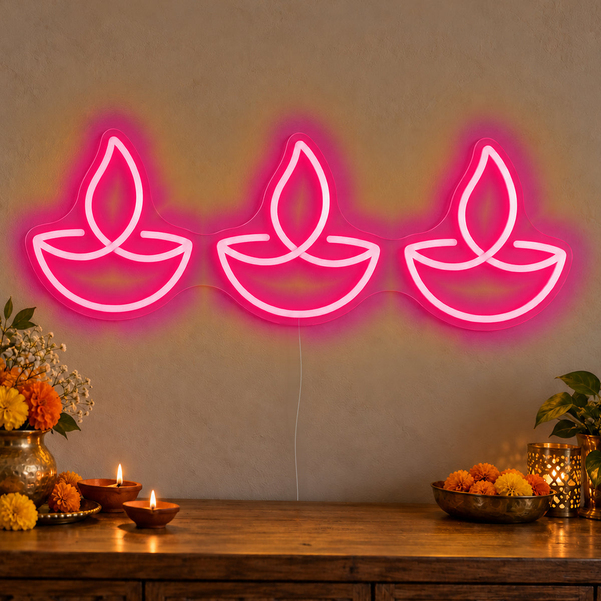 Three Diyas Neon Sign in rose red LED neon on clear acrylic, angled view