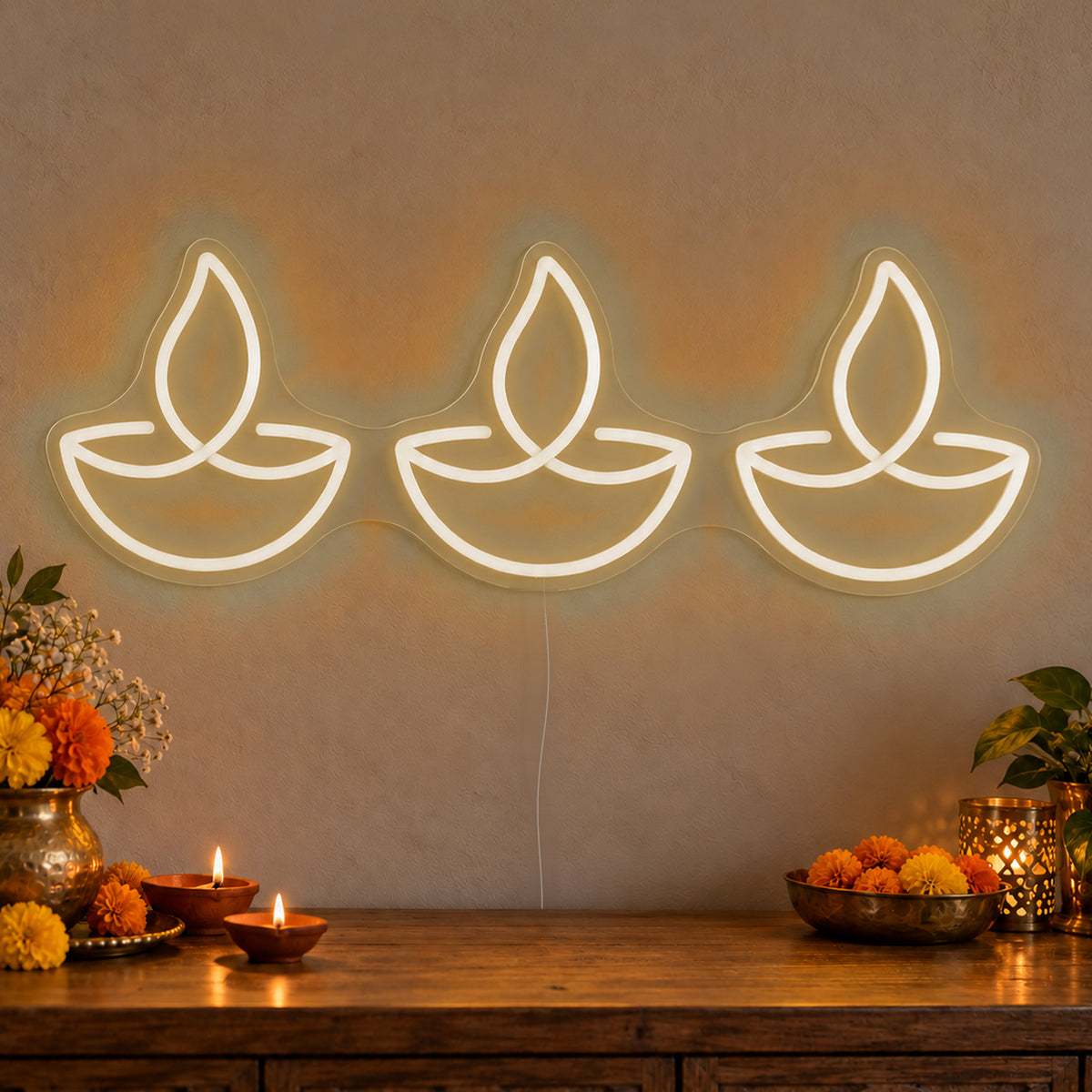 Three Diyas Neon Sign in warm white LED neon on clear acrylic, angled view