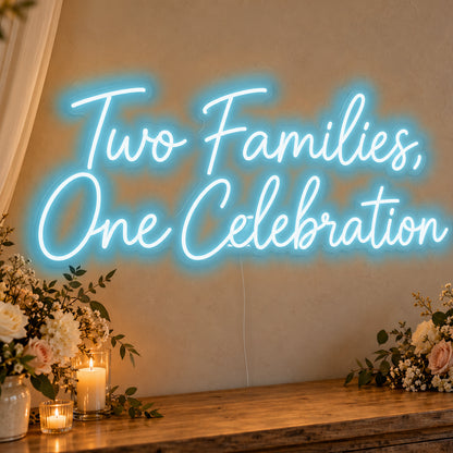 Two Families One Celebration Neon Sign in ice blue LED neon on clear acrylic, angled view