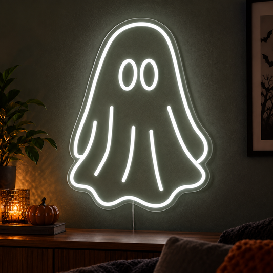 White Ghost Neon Sign featuring a white ghost outline with two oval eyes and a flowing sheet shaped body, displayed on a dark wall above a wooden sideboard.