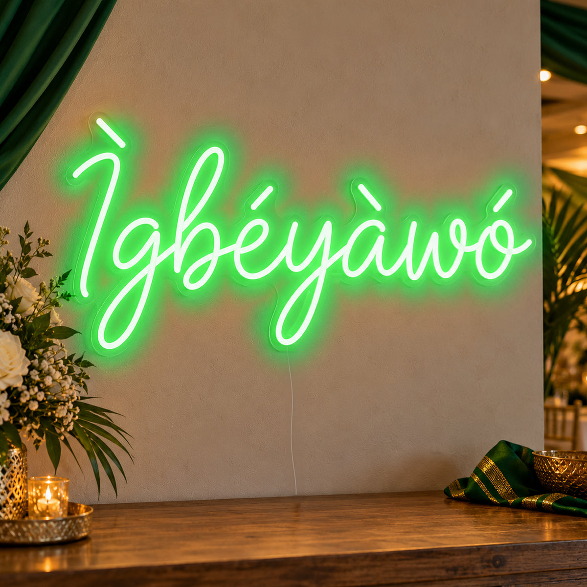 Ìgbéyàwó Yoruba Wedding Neon Sign in green LED neon on clear acrylic, angled view