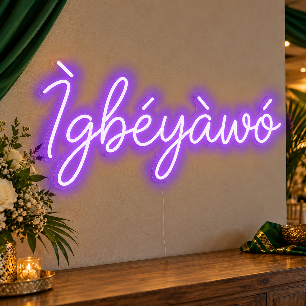 Ìgbéyàwó Yoruba Wedding Neon Sign in purple LED neon on clear acrylic, angled view