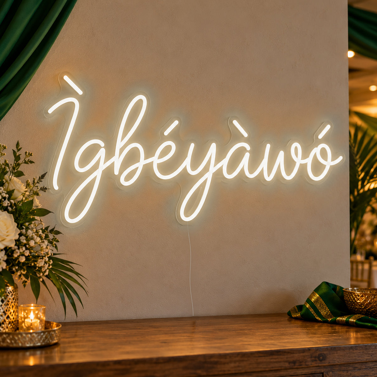Ìgbéyàwó Yoruba Wedding Neon Sign in warm white LED neon on clear acrylic, angled view