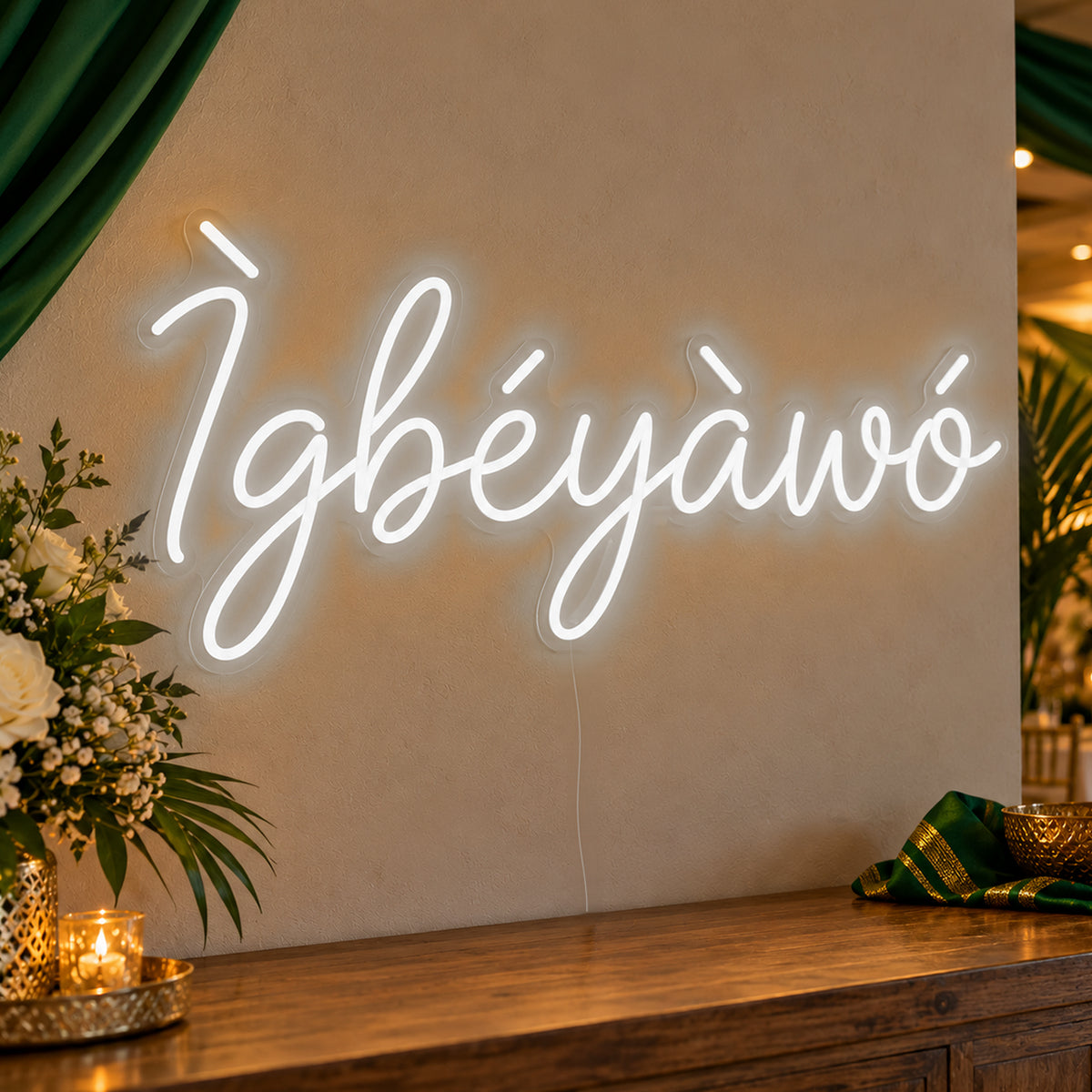 Ìgbéyàwó Yoruba Wedding Neon Sign in white LED neon on clear acrylic, angled view